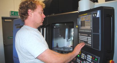 Mills CNC's Matt North working on machinery