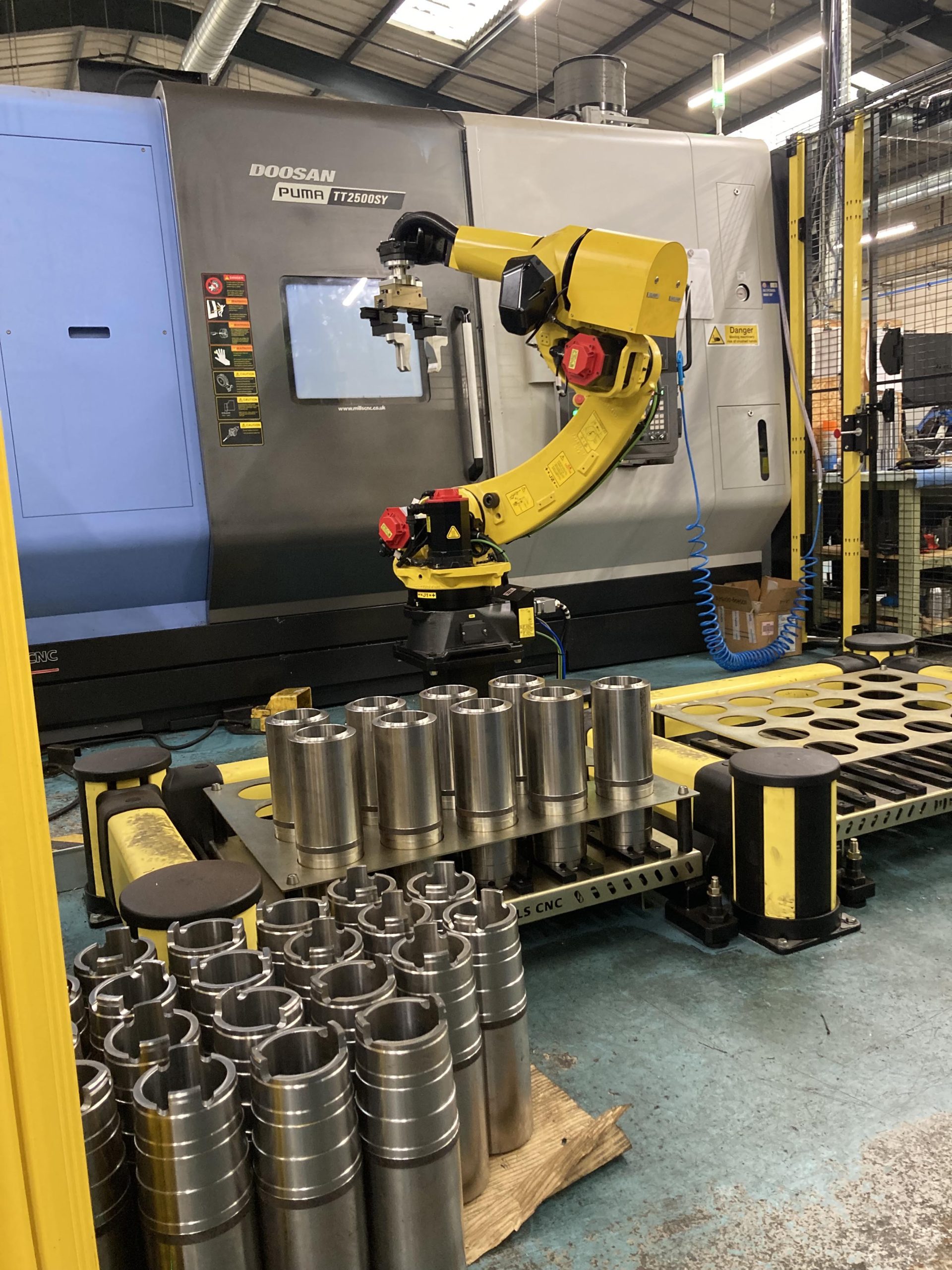 Automated Manufacturing Cell for Puma TT2500SY Twin Turret Horizontal Lathe