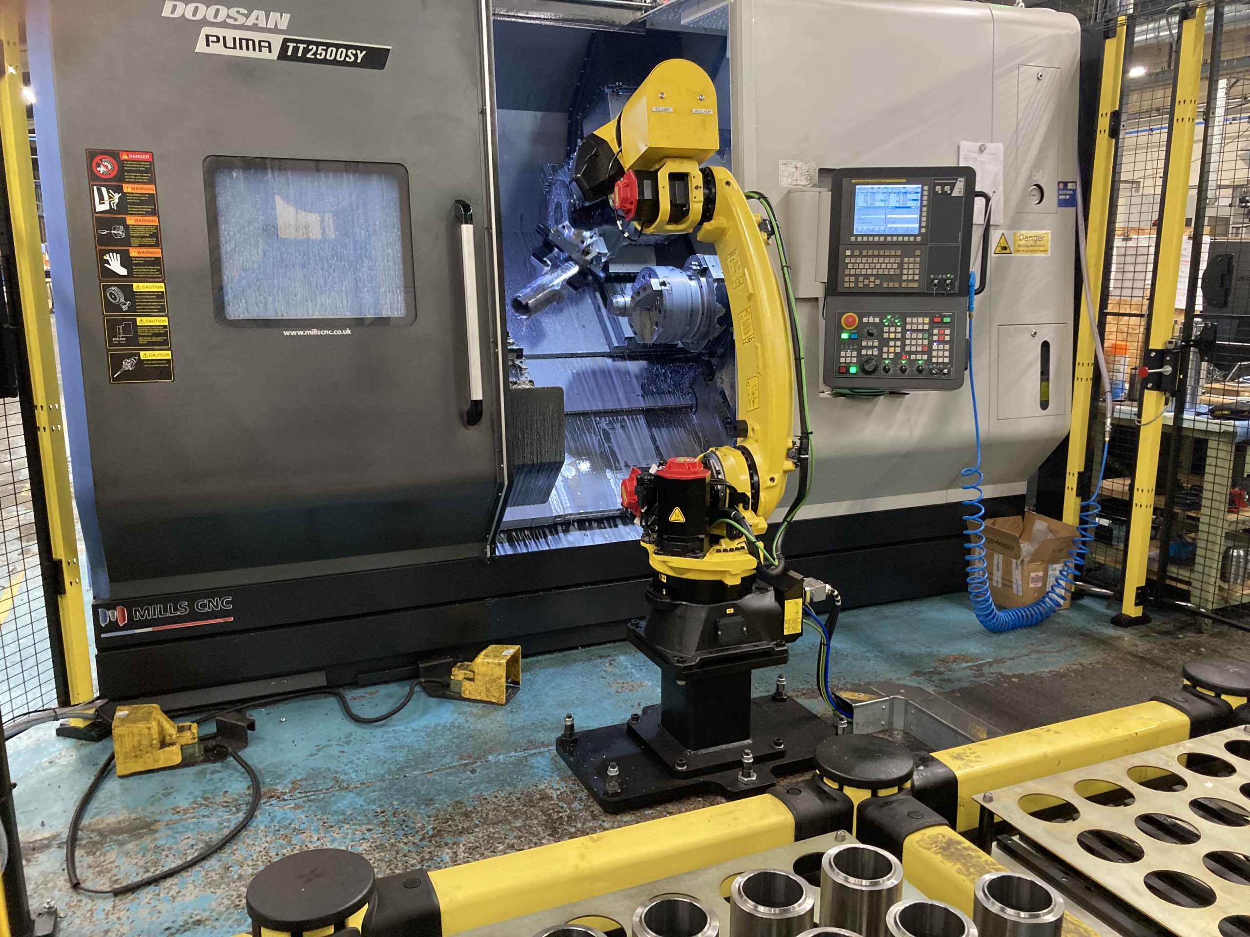 Automated Manufacturing Cell for Puma TT2500SY Twin Turret Horizontal Lathe